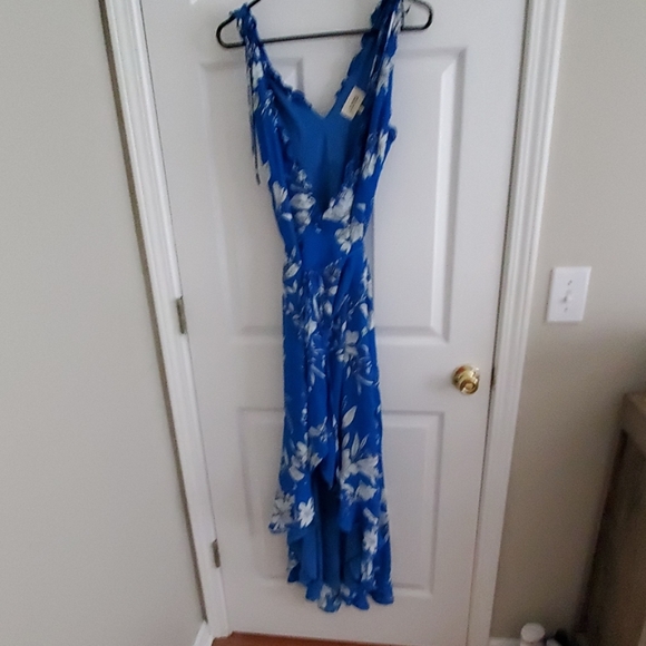 Vici Dresses & Skirts - Vici Blue Floral Wrap Dress